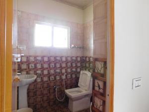 Koupelna v ubytování Cauvery Homestay