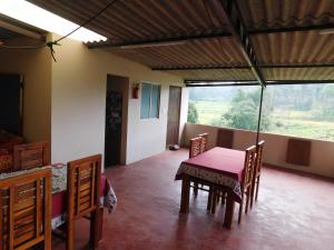 Posezení v ubytování Cauvery Homestay