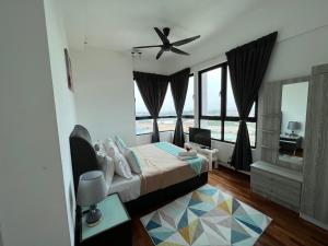 Postel nebo postele na pokoji v ubytování D'Gunduls Homestay Family Suite 2R 2B by DGH I-CITY