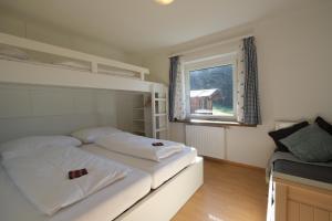 GO FOR MOUNTAINS Appartements房間的床