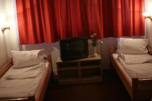 Postel nebo postele na pokoji v ubytování Vila Diakonia