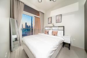 Fotografie z fotogalerie ubytování ALH Vacay - Amazing 1 Bedroom in Vera Residence v Dubaji