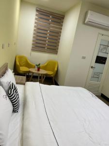 Postel nebo postele na pokoji v ubytování Downtown Accommodation