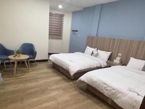 Postel nebo postele na pokoji v ubytování Downtown Accommodation