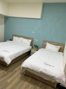 Postel nebo postele na pokoji v ubytování Downtown Accommodation