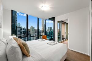 Ένα ή περισσότερα κρεβάτια σε δωμάτιο στο Exclusive Stays - Mainpoint +16 φωτογραφίες