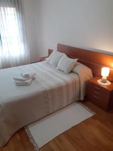 Cama o camas de una habitación en Viveiro, playa de Covas