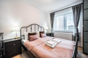 Posteľ alebo postele v izbe v ubytovaní Rent like home - Browary Wrocławskie