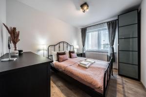 Posteľ alebo postele v izbe v ubytovaní Rent like home - Browary Wrocławskie