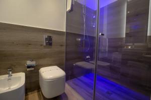 Kúpeľňa v ubytovaní Luxmarì Hotel & Spa