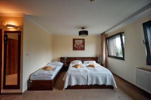 Postel nebo postele na pokoji v ubytování President Hotel Montfort
