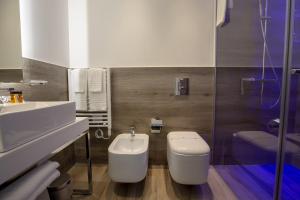 Kúpeľňa v ubytovaní Luxmarì Hotel & Spa