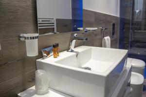 Kúpeľňa v ubytovaní Luxmarì Hotel & Spa