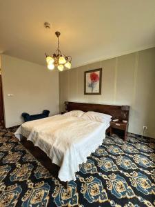 Postel nebo postele na pokoji v ubytování President Hotel Montfort