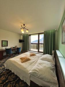 Postel nebo postele na pokoji v ubytování President Hotel Montfort