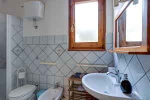 Koupelna v ubytování Samarighouse