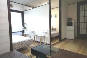 Katil atau katil-katil dalam bilik di Kiki HouseH --Self Check-in -- Room Number & Password is in the following email