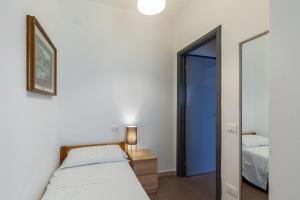 Postel nebo postele na pokoji v ubytování Residence Caravel 9