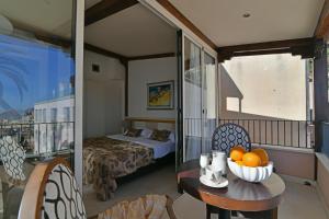 Posteľ alebo postele v izbe v ubytovaní Hotel Le Chevalier