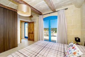 Postel nebo postele na pokoji v ubytování Ta Rena Holiday Home + 27 fotografií