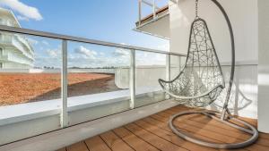 Balkón alebo terasa v ubytovaní Apartamenty Sun & Snow Polanki Aqua z basenem