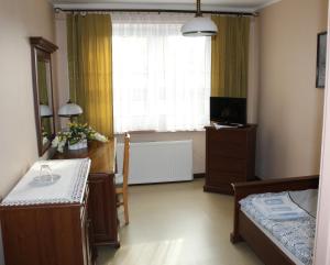 TV a/nebo společenská místnost v ubytování Hotel Sportowy