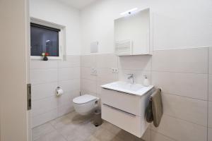 Koupelna v ubytování ApartWehr Business&Ferien Apartment Lila