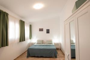 Postel nebo postele na pokoji v ubytování Wohnung Buganvilla