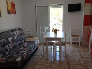 Posedenie v ubytovaní Apartamento Jacinta Rojo
