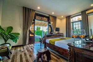 Zona d'estar a Nipa Riverside Villa By The Little Hoi An
