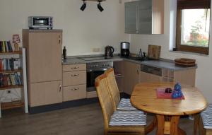 Kuchyň nebo kuchyňský kout v ubytování Ferienwohnung Dresden Pillnitz am Weinberg