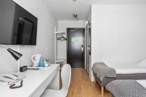 TV i/ili zabavni centar u objektu Best Western Hotell SoderH