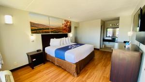 Ένα ή περισσότερα κρεβάτια σε δωμάτιο στο Days Inn by Wyndham Maysville Kentucky