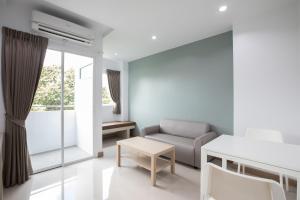 Posezení v ubytování Green Hotel Phuket