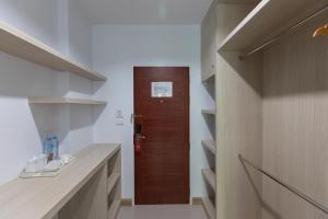 Kuchyň nebo kuchyňský kout v ubytování Green Hotel Phuket