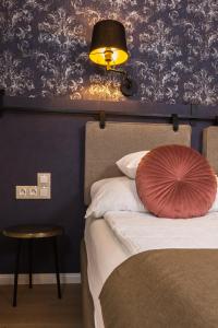 Posteľ alebo postele v izbe v ubytovaní Apáca 30 Apartman **** Győr