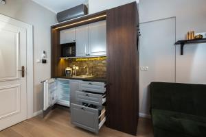 Kuchyňa alebo kuchynka v ubytovaní Apáca 30 Apartman **** Győr