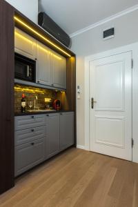 Kuchyňa alebo kuchynka v ubytovaní Apáca 30 Apartman **** Győr