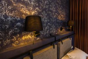 Posteľ alebo postele v izbe v ubytovaní Apáca 30 Apartman **** Győr