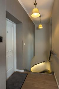 Posteľ alebo postele v izbe v ubytovaní Apáca 30 Apartman **** Győr