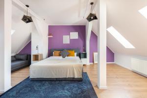 Postel nebo postele na pokoji v ubytování Triple M Hotel + 37 fotografií