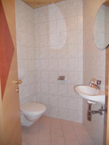 Łazienka w obiekcie Appartement beim Brunnen 12