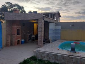 Kolam renang di atau dekat dengan Recanto dos Jardim's Arraial do Cabo