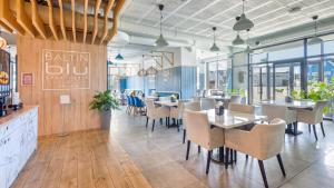 Restauracja lub miejsce do jedzenia w obiekcie Apartamenty Sun & Snow BLUE II