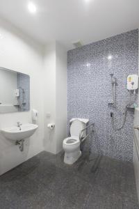Koupelna v ubytování Green Hotel Phuket