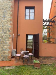 A garden outside Appartement - Le corti di Orciatico