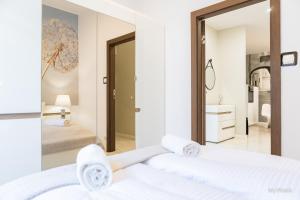 Posteľ alebo postele v izbe v ubytovaní Apartament z historią, Klahra MyWeek