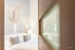 Posteľ alebo postele v izbe v ubytovaní Apartament z historią, Klahra MyWeek