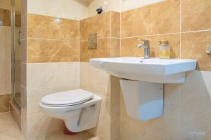 Kúpeľňa v ubytovaní Apartament z historią, Klahra MyWeek