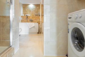 Kúpeľňa v ubytovaní Apartament z historią, Klahra MyWeek